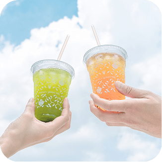two cold tea drinks cheersing